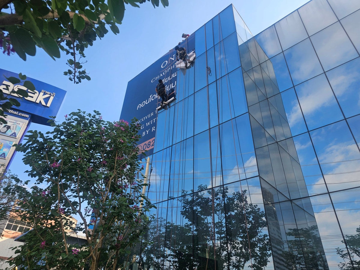 สติ๊กเกอร์ See Through ติดกระจกอาคารสูง