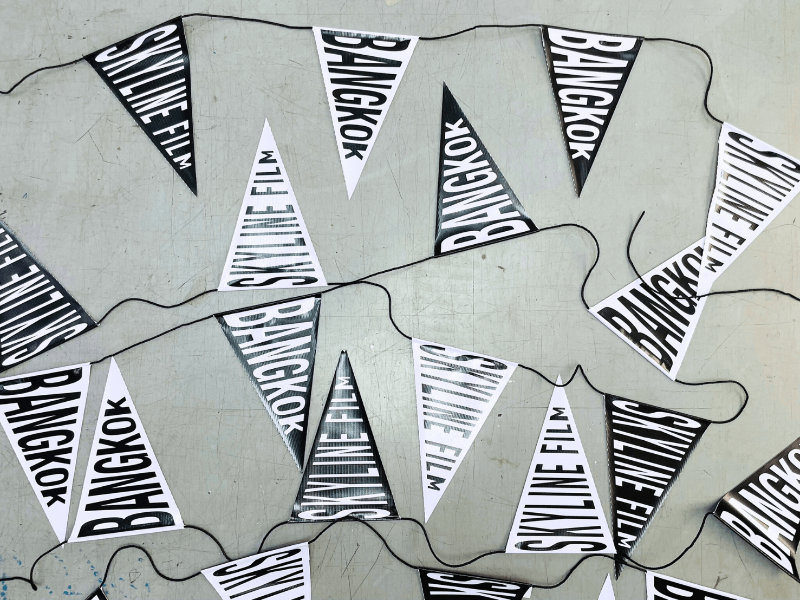 ธงราว Bunting Flag พิมพ์สีสดคมชัด น้ำหนักเบา แข็งแรง เหมาะสำหรับงานอีเวนต์ งานเทศกาล งานโปรโมชัน และตกแต่งหน้าร้าน