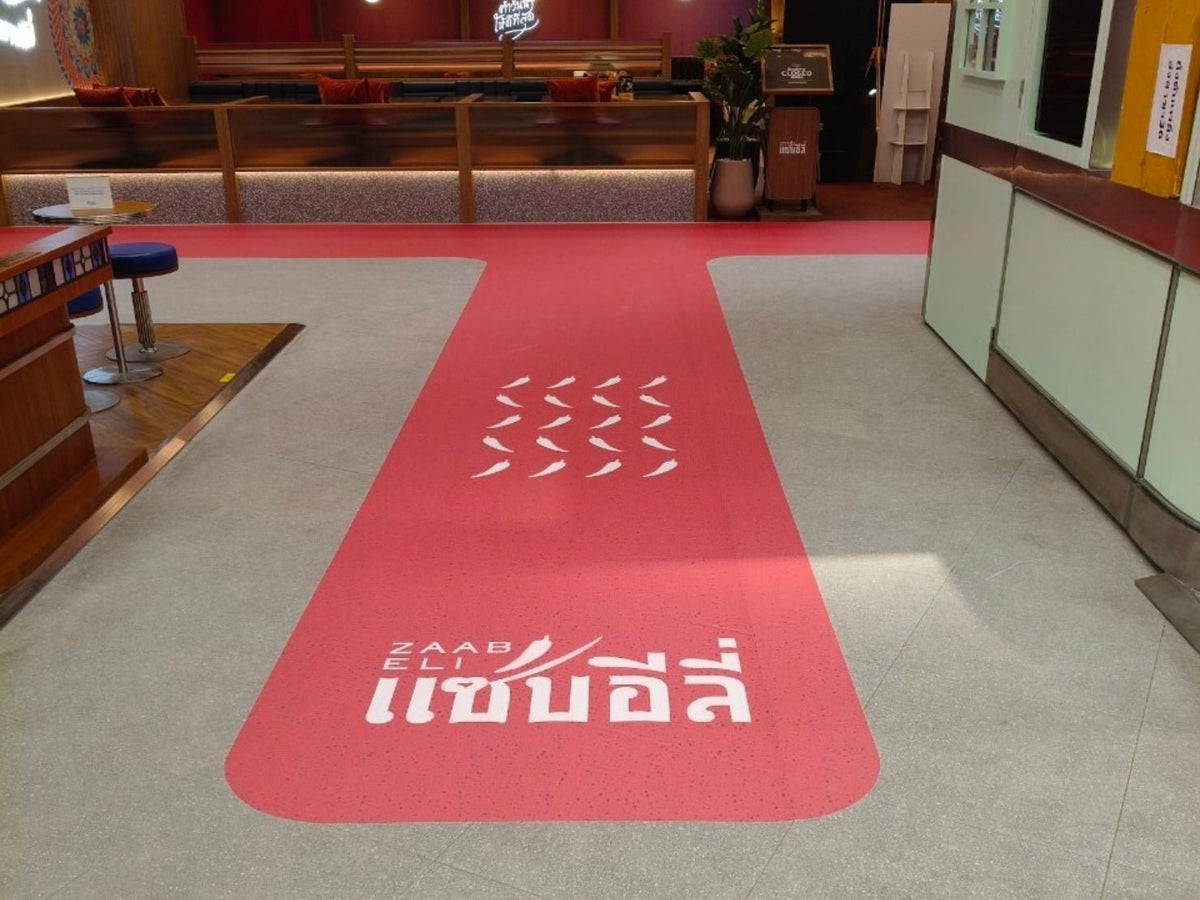 สติ๊กเกอร์ติดพื้น และสติ๊กเกอร์ติดทางเดิน พิมพ์คมชัด กันลื่น ทนทาน เหมาะสำหรับงานประชาสัมพันธ์ ป้ายบอกทาง และงานอีเวนต์