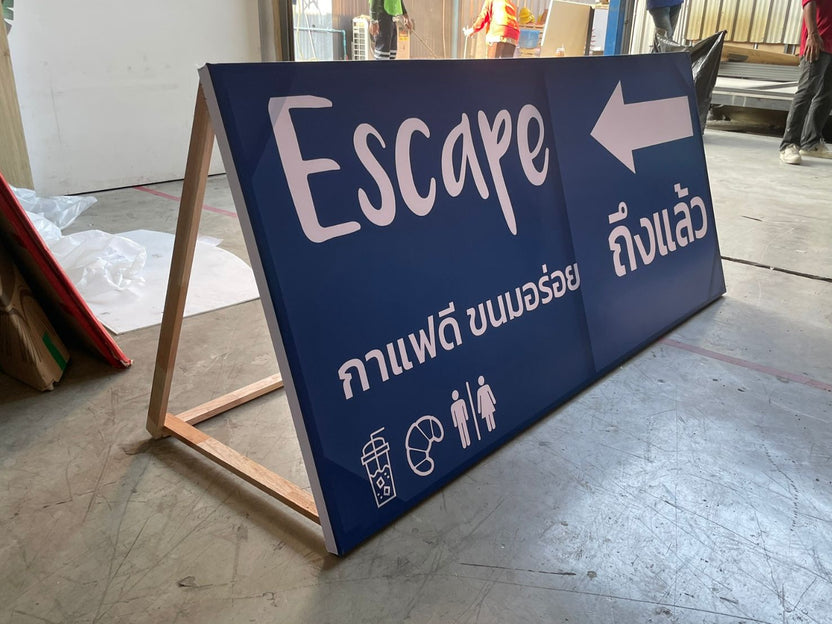 ป้ายไวนิล ขึงโครงไม้ | ปรับตามน้ำหนักและขนาดป้าย ไม้จ้อย ผิวเรียบ ตีกรอบได้คม เหมาะ — รับทำครบวงจร