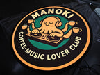 ป้ายไฟวงกลม Manoki Coffee-Music Lover Club ปลาหมึก DJ ถือกาแฟ