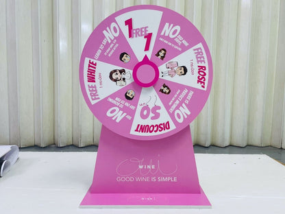ป้ายหมุนวงล้อขนาดเล็กสีชมพู โปรโมชั่นตัวการ์ตูนรางวัลฟรีไวท์ส่วนลด50