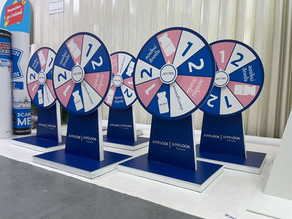 ป้ายหมุนวงล้อขนาดเล็ก สีน้ำเงินชมพู ฐานสีน้ำเงิน