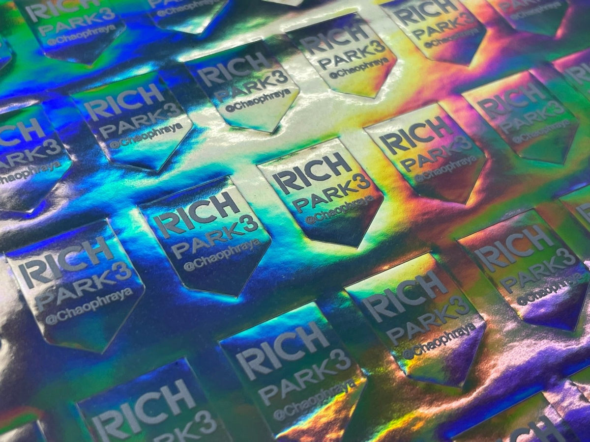 สติ๊กเกอร์โฮโลแกรม Hologram Sticker กันปลอม สะท้อนแสงหลากสี เพิ่มมูลค่าแบรนด์ เหมาะสำหรับฉลากสินค้า และงานพรีเมียม