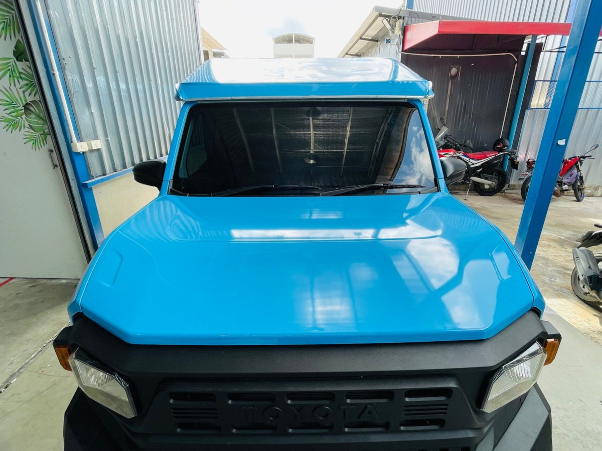 แร็ปสติ๊กเกอร์กระบะ Hilux Champ พิมพ์คมชัด วัสดุทนทาน เหมาะสำหรับงานโฆษณาและตกแต่งรถ