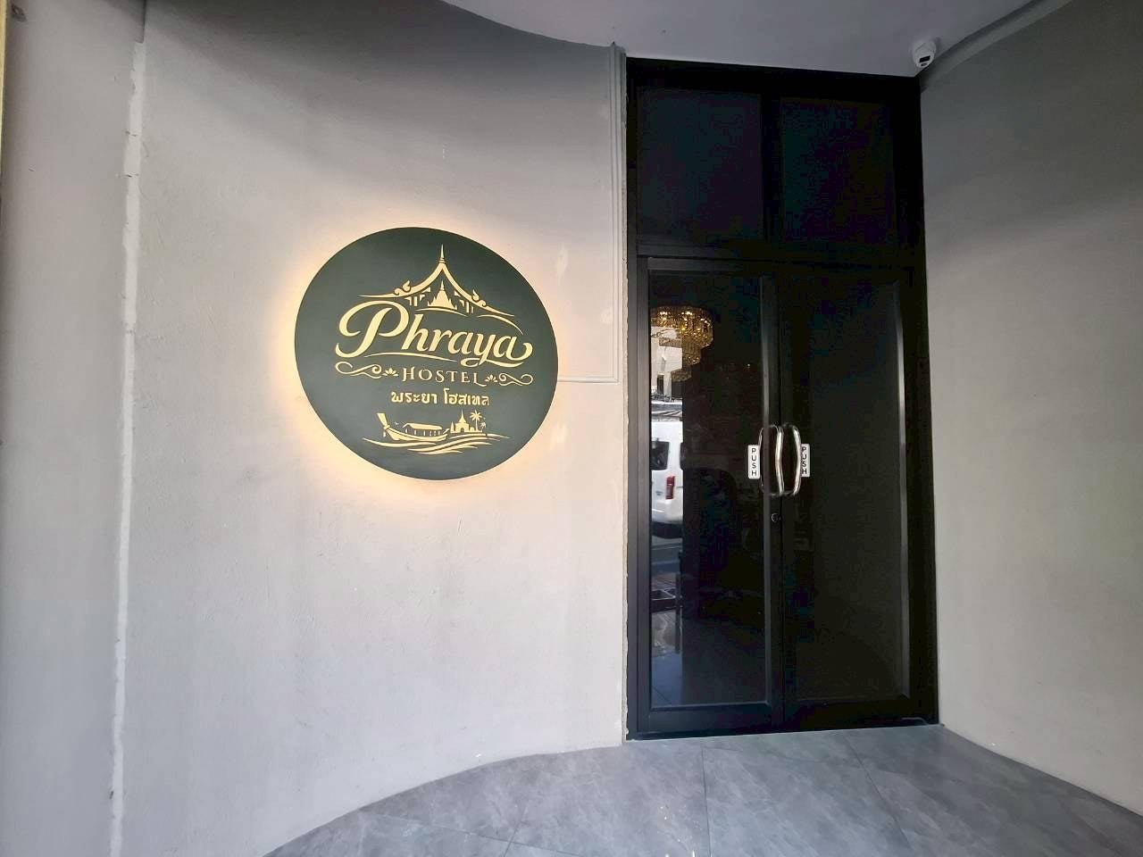 Halo-lit zinc die-cut logo sign circular 90cm standoff mount outdoor installation