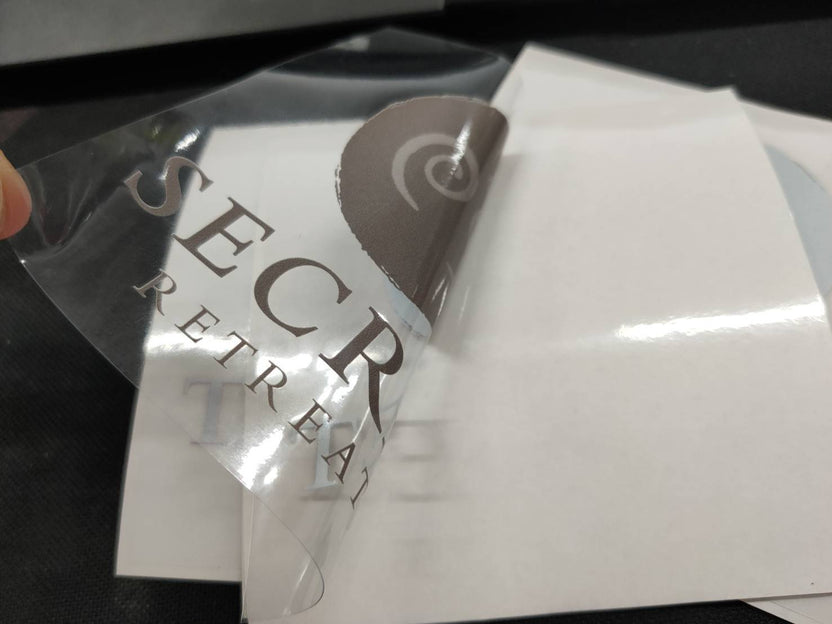 สติ๊กเกอร์สูญญากาศ ติดกระจกรถ เข้า-ออกหมู่บ้าน - Octopus Media Solutions