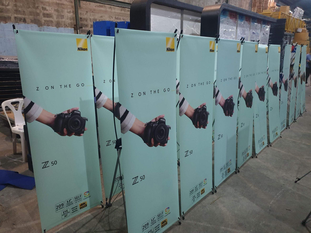 X Stand เอ็กซ์สแตน POSM ป้ายศิลปินเกาหลี ป้ายประชาสัมพันธ์ อุปกรณ์ออกบูธ มีอะไรบ้าง แสดงสินค้า คอนเสิร์ต ดาราเกาหลี