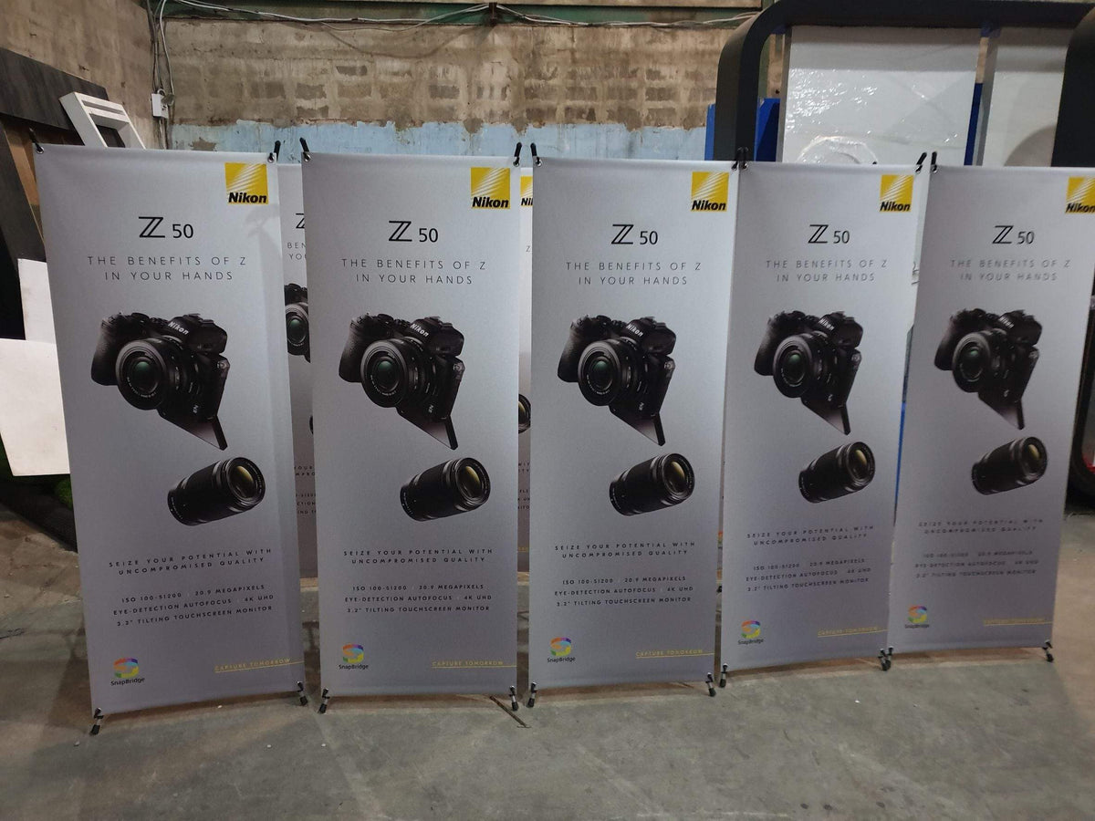 X-Stand ป้ายตั้ง ป้ายเอ็กซ์สแตน ตัวอย่าง บูธแสดงสินค้า ป้ายโฆษณา อุปกรณ์ออกบูธ มีอะไรบ้าง