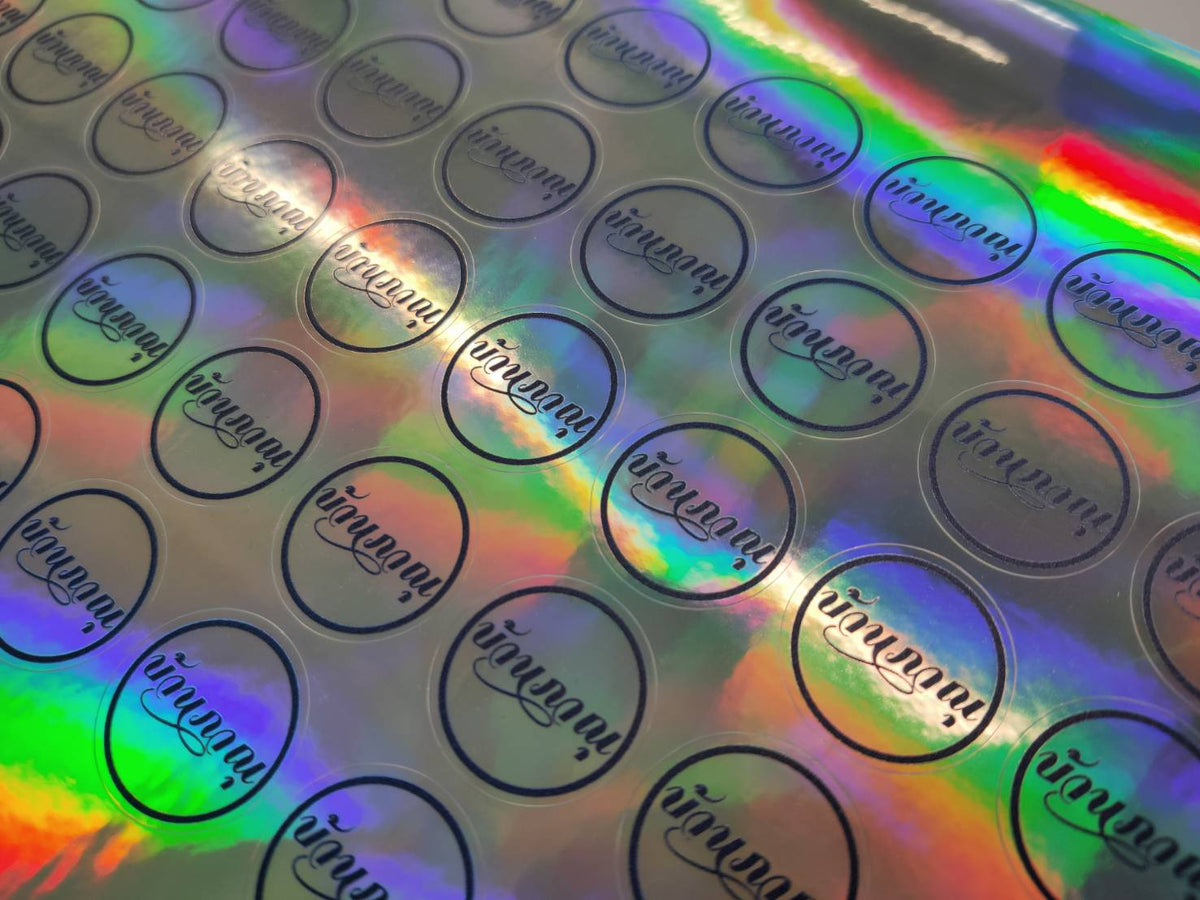 สติ๊กเกอร์โฮโลแกรม Hologram Sticker กันปลอม สะท้อนแสงหลากสี เพิ่มมูลค่าแบรนด์ เหมาะสำหรับฉลากสินค้า และงานพรีเมียม