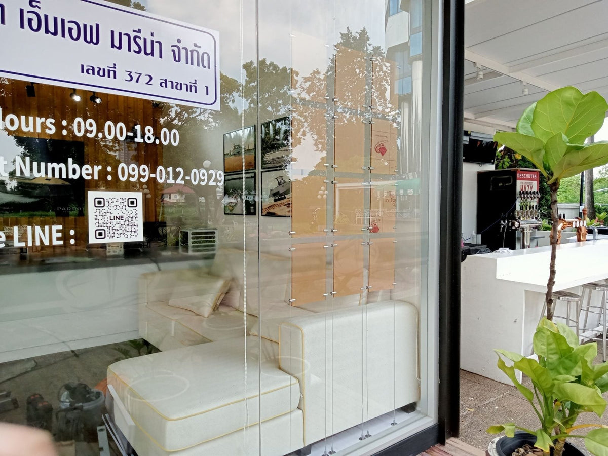 ป้ายแขวนลวดสลิง - Octopus Media Solutions