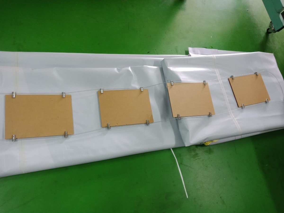 ป้ายแขวนลวดสลิง - Octopus Media Solutions