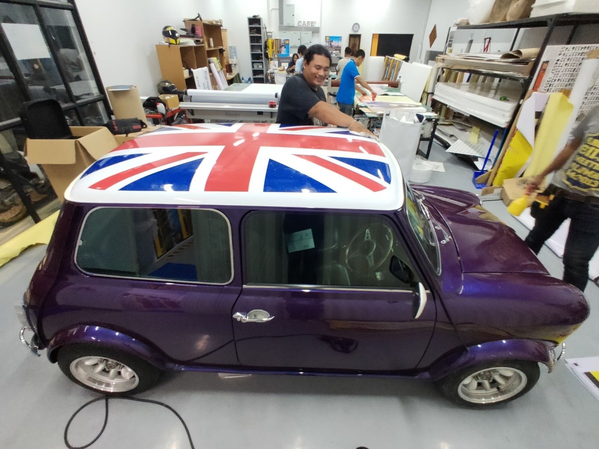 สติ๊กเกอร์ติดหลังคารถมินิ - Octopus Media Solutions