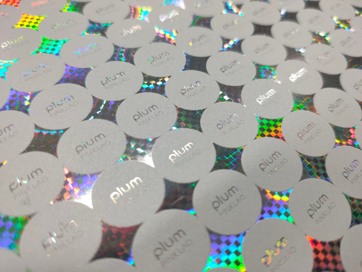 สติ๊กเกอร์โฮโลแกรม Hologram Sticker กันปลอม สะท้อนแสงหลากสี เพิ่มมูลค่าแบรนด์ เหมาะสำหรับฉลากสินค้า และงานพรีเมียม