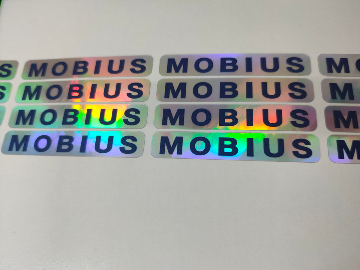 สติ๊กเกอร์โฮโลแกรม Hologram Sticker กันปลอม สะท้อนแสงหลากสี เพิ่มมูลค่าแบรนด์ เหมาะสำหรับฉลากสินค้า และงานพรีเมียม