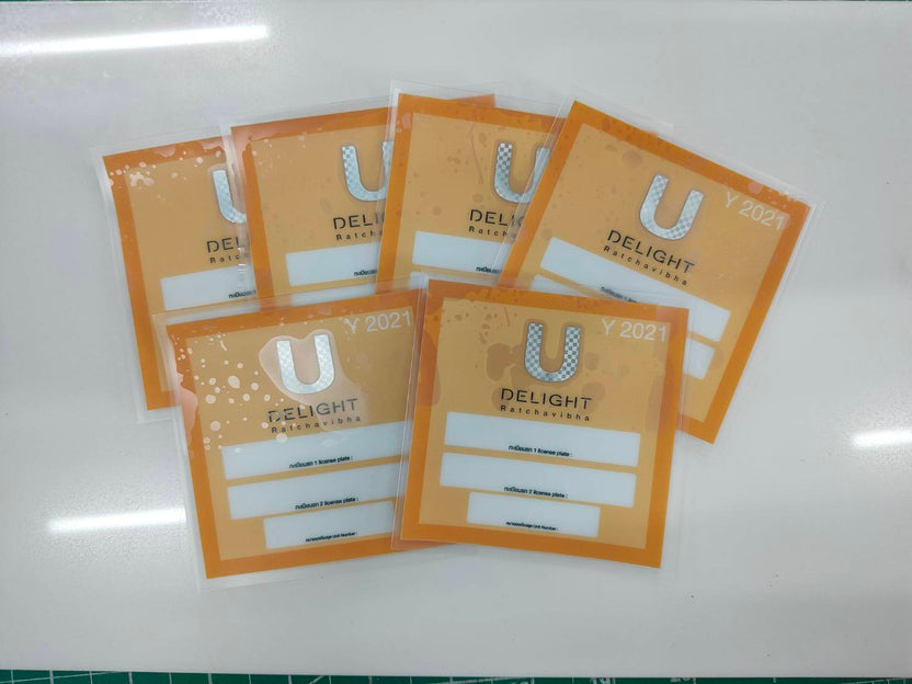 สติ๊กเกอร์สูญญากาศ ติดกระจกรถ เข้า-ออกหมู่บ้าน - Octopus Media Solutions