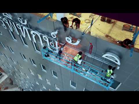 building name signage illuminate metal letters