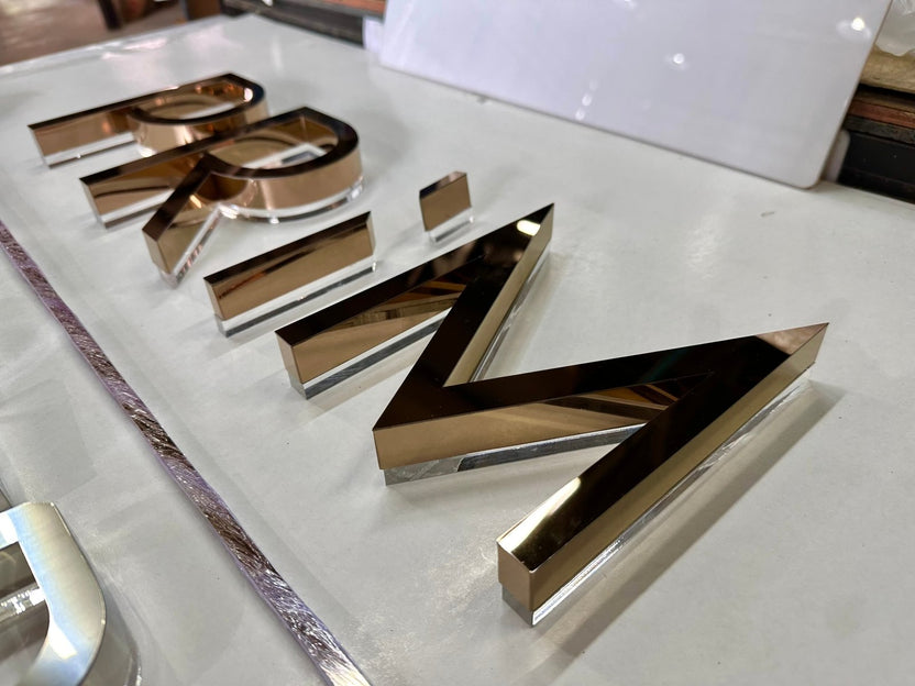 ป้ายสแตนเลสคอปเปอร์ Mirror เงาทองแดงหรูหรา แข็งแรง เหมาะสำหรับป้ายบริษัทและอาคารพาณิชย์
