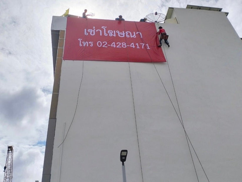 Install vinyl signs, pipe, tie ropes, and attach anchors to buildings.