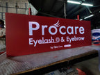 ป้ายไฟ LED สีแดง Procare บริการขนตาและคิ้ว ตัวอักษรขาวสว่าง
