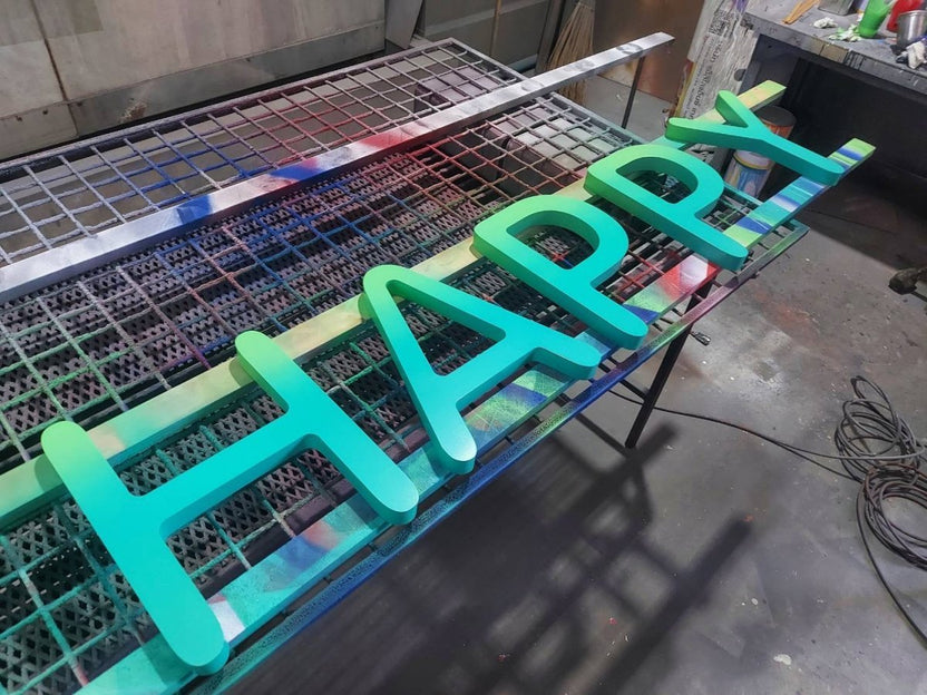 อักษรโลหะพ่นสี ป้ายโลโก้ ป้ายโลหะพ่นไล่เฉดสี ป้ายทำสี gradient ป้ายพ่นสีสวยๆ ป้ายทำสีสวยๆ - Octopus Media Solutions