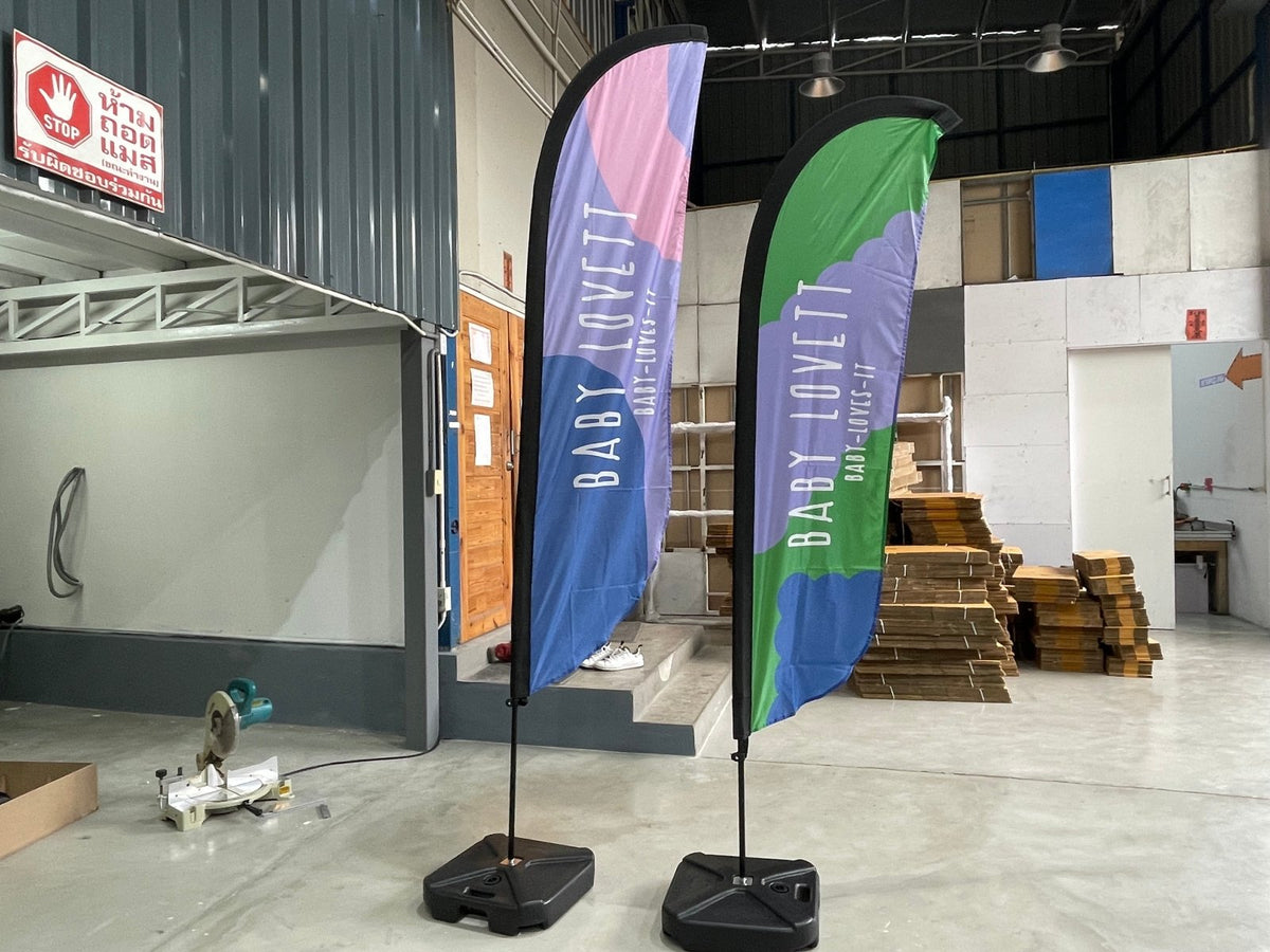 ธงชายหาด ธงปีกนก Beach Flag พิมพ์สีสดคมชัด โครงสร้างแข็งแรง เหมาะสำหรับงานอีเวนต์ โปรโมชัน และสื่อโฆษณาหน้าร้าน