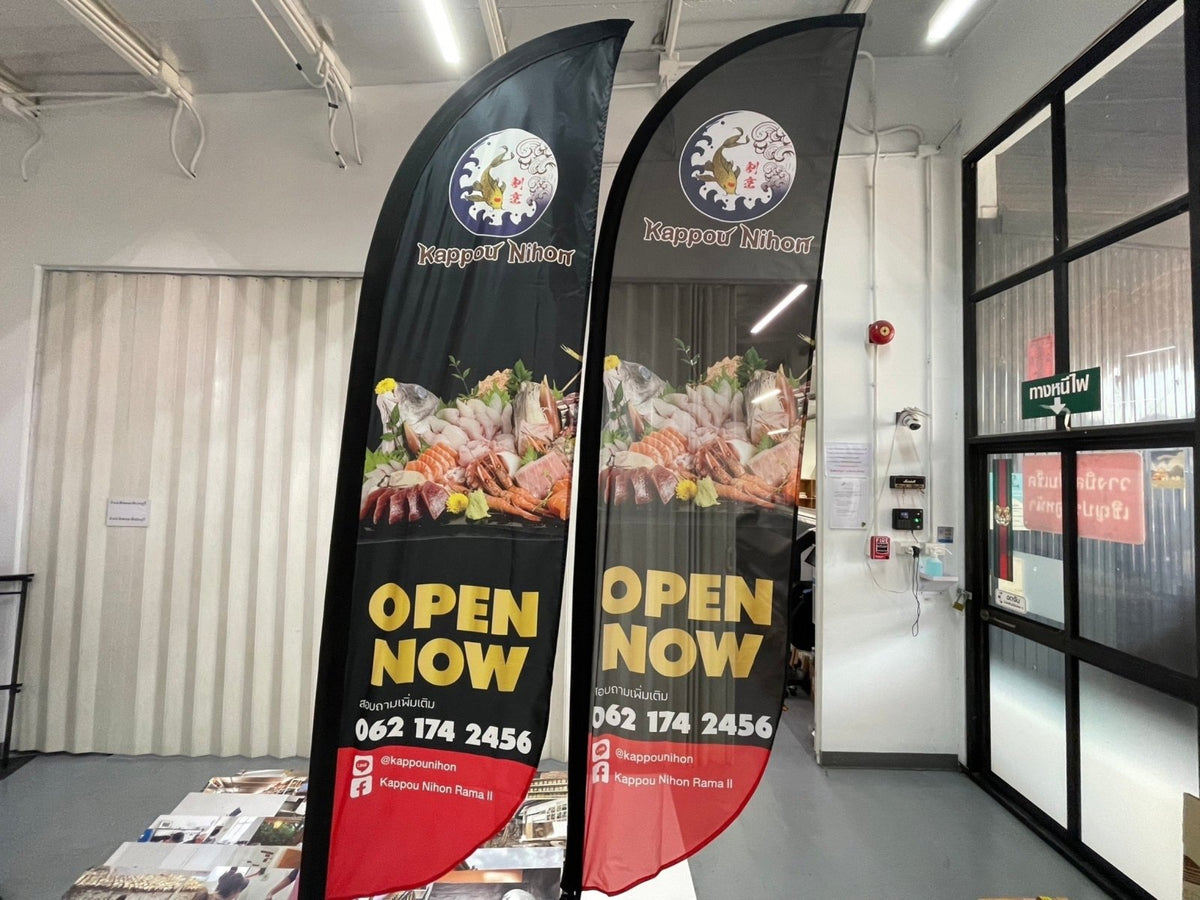 ธงชายหาด ธงปีกนก Beach Flag พิมพ์สีสดคมชัด โครงสร้างแข็งแรง เหมาะสำหรับงานอีเวนต์ โปรโมชัน และสื่อโฆษณาหน้าร้าน