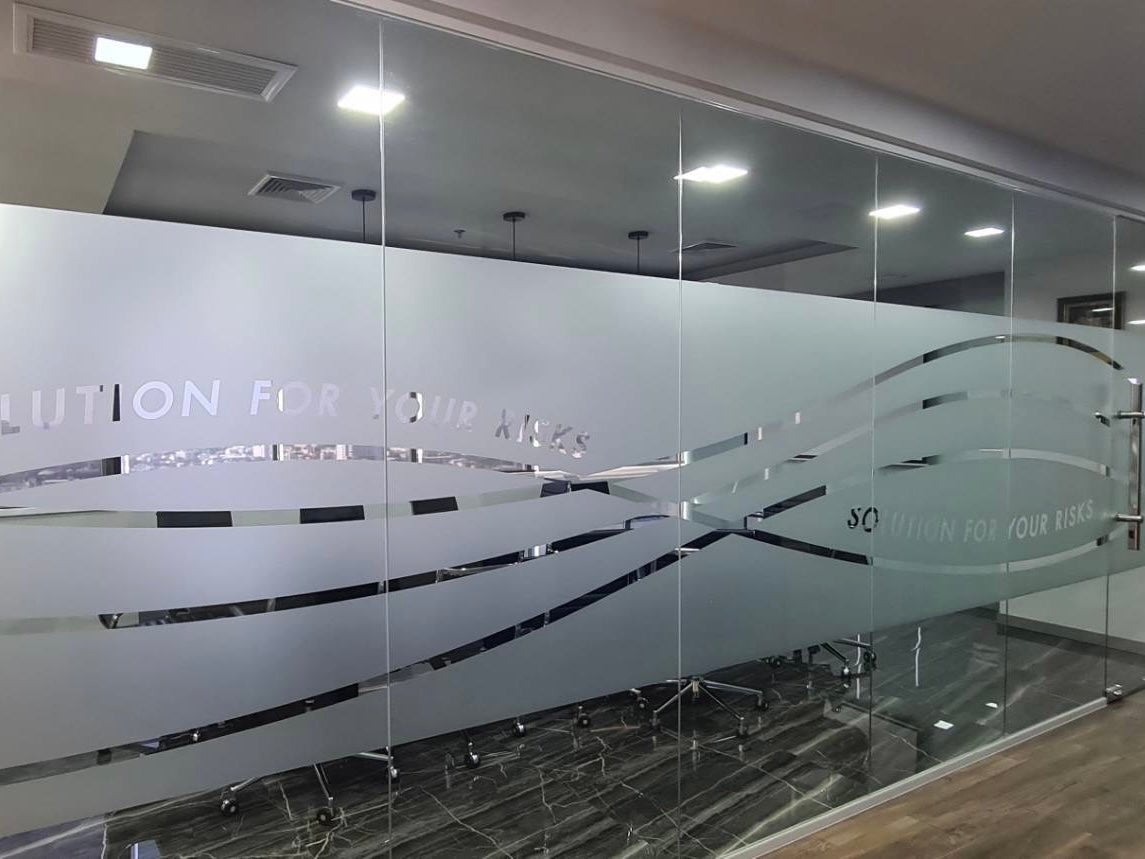 Frosted stickers, perforated, die-cut, attached to the glass