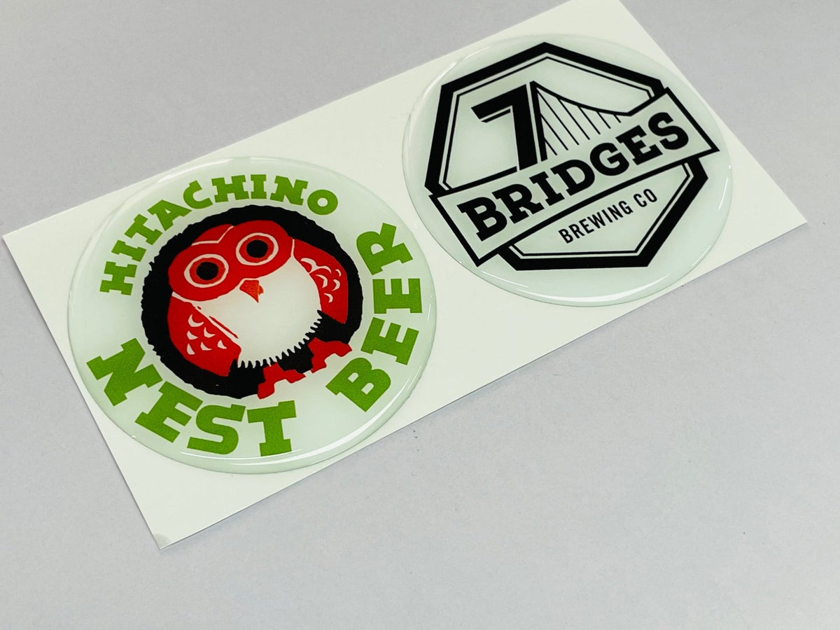 สติ๊กเกอร์เรซิ่น และสติ๊กเกอร์นูน Resin Dome Sticker พิมพ์คมชัด เคลือบเรซิ่นเงางาม เหมาะสำหรับฉลากสินค้า โลโก้ และงานพรีเมียม